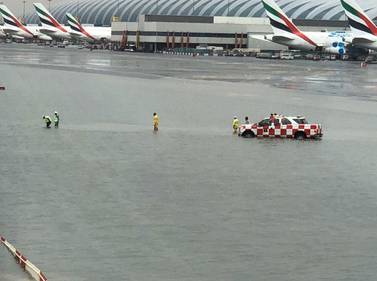 Passengers heading to Dubai International Airport faced considerable delays due to flooding. The National 