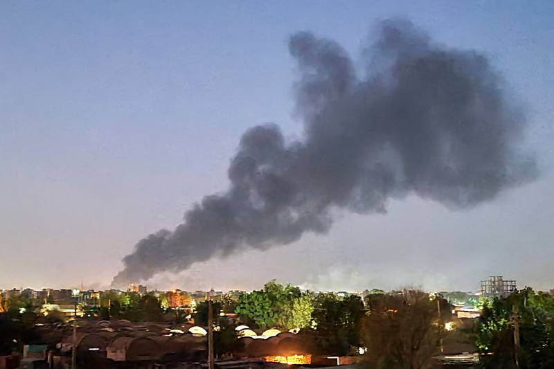 Khartoum burns amid fighting between the forces of two rival generals in Sudan. AFP