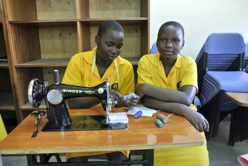 LIRA, UGANDA, Thursday, November, 23, 2017 // Pupils from St Katherine Secondary School demonstrate their sewing station as part of an exhibition for Dubai Cares Thursday, November 23, 2017. St. Katherine Secondary School is one of 40 schools in 39 districts across Uganda to share in a US$1,188,280 donation from Dubai Cares aimed at promoting girls’ participation in stem subjects. In all, about 6,000 pupils, 500 science teachers and 40 head teachers will directly benefit from the funding, which is being managed and distributed by the Forum for African Women Educationalists – Uganda Chapter through 2019. (Roberta Pennington/The National)  