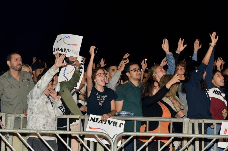 Fans react as they watch Colombian singer J Balvin performing during Mawazine. EPA.