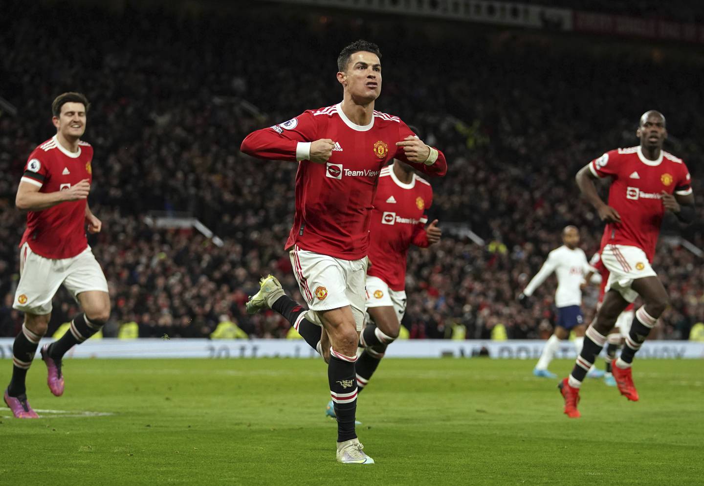 Manchester United's Cristiano Ronaldo celebrates after completing his hat-trick against Tottenham Hotspur on March 12, 2022. AP