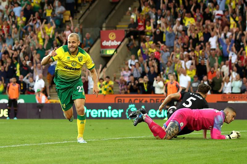 NORWICH, ENGLAND - SEPTEMBER 14: Teemu Pukki of Norwich City celebrates after scoring his team's third goal during the Premier League match between Norwich City and Manchester City at Carrow Road on September 14, 2019 in Norwich, United Kingdom. (Photo by Marc Atkins/Getty Images)