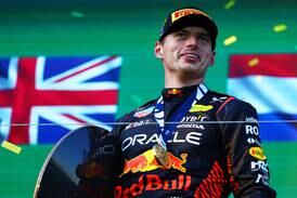 Max Verstappen celebrates on the podium after winning the Australian Grand Prix at Albert Park. Getty
