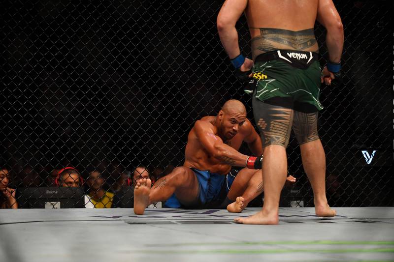 Ciryl Gane is sent to the canvas by Tai Tuivasa during their UFC heavyweight fight. AFP