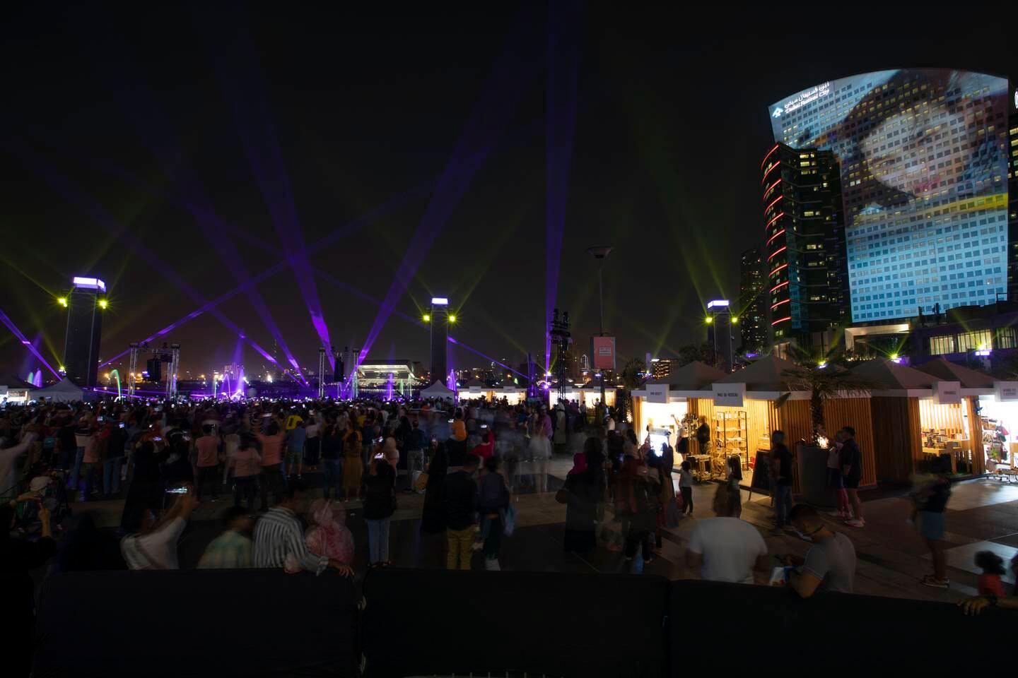 Fans turn out to see the light and laser show to Suho’s 'Hurdle' at Dubai Festival City.  Ruel Pableo for The National