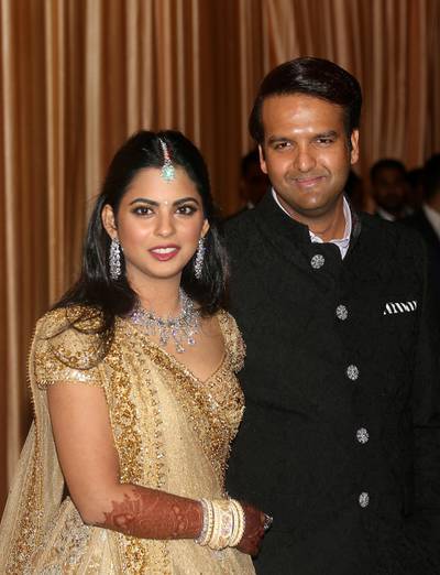 Isha Ambani and her new husband Anand Piramal at their wedding reception. Photo: Reuters