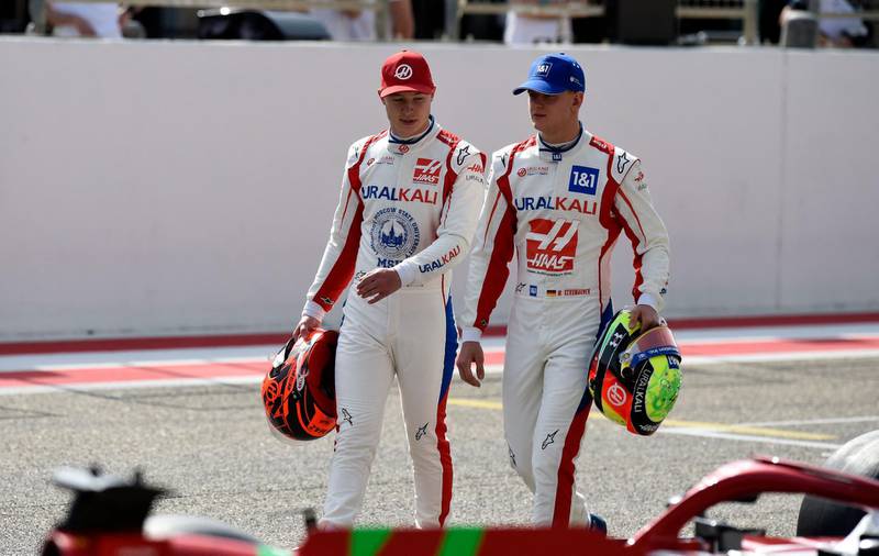 Haas driver Mick Schumacher chats with teammate Nikita Mazepin ahead of the first day of the Formula One pre-season testing at the Bahrain International Circuit. AFP