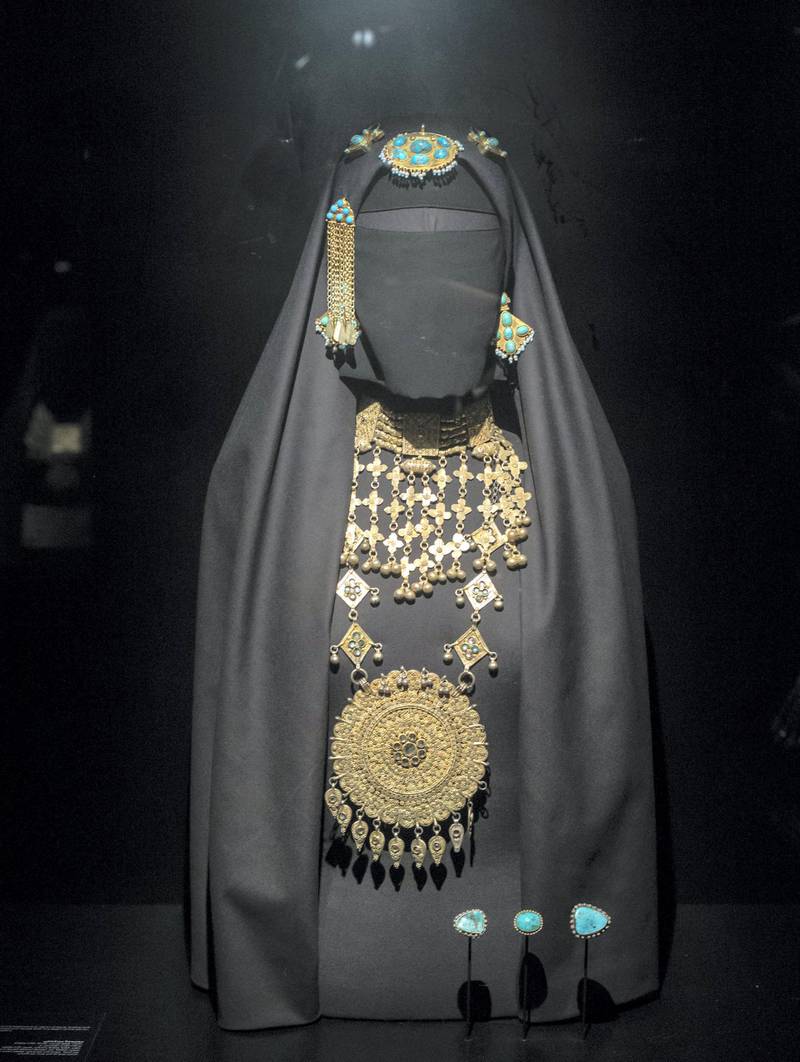 DUBAI, UNITED ARAB EMIRATES -A jewelry ensemble, headpiece, necklace, bangles and waist belt on display at the Hidden Treasures, a look at early 20th century Saudi Arabia jewelry,  show how diverse the different regions fashion was. Leslie Pableo for The National