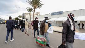 'They burnt everything': Libyan security forces break up protest by migrants