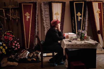 Antonina, 60, at a funeral home where she works and now lives with neighbours in Severodonetsk. AFP