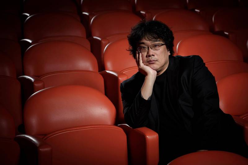 This Oct. 8, 2019 photo shows filmmaker Bong Joon-Ho posing for a portrait at the Whitby Hotel screening room in New York to promote his film "Parasite." On Monday, Jan. 13, Joon-Ho was nominated for an Oscar for best director for his work on the film. (Photo by Christopher Smith/Invision/AP)