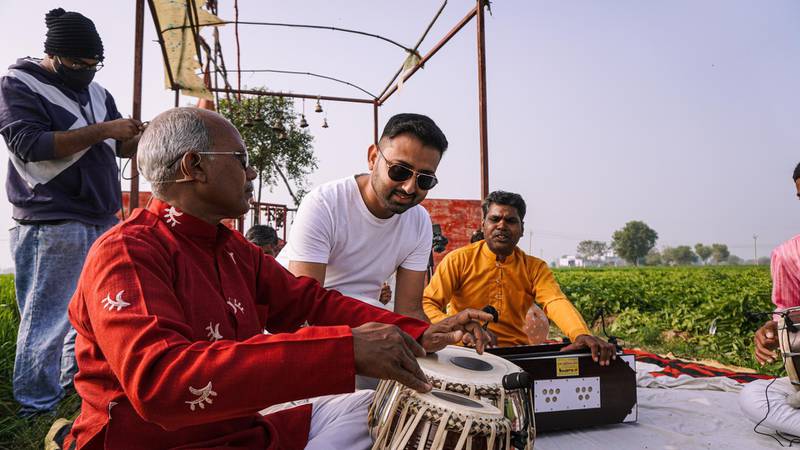Abhinav Agrawal, centre, during sound check for the recording of one of the folk musicians. Agrawal, who founded the Anahad Foundation, will put the work of local musicians in India in the spotlight. 