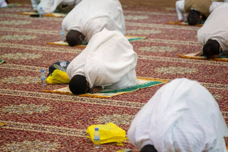 Muslim pilgrims pray on Arafat Day. REUTERS