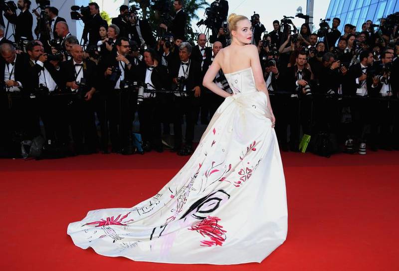 Elle Fanning wore a hand-painted Vivienne Westwood couture gown to Cannes in 2017. EPA