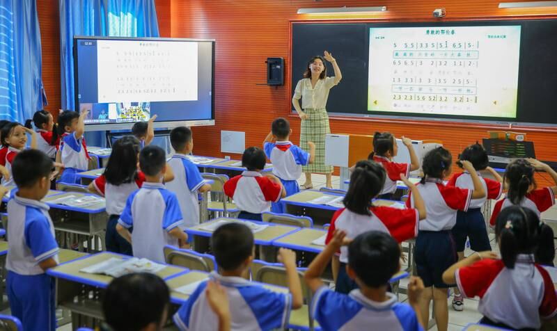 China: Lengthy school days are the norm, with many pupils completing nine hours of studies. Getty Images



