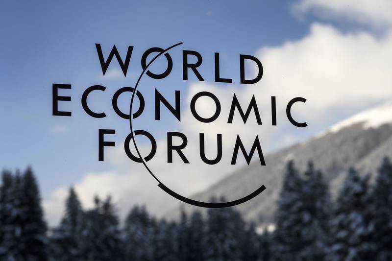 (FILES) This file photo taken on January 16, 2017 shows a sign of the World Economic Forum (WEF) at Davos' Congress Centre on the eve of the opening day of the summit. Government and business leaders will trek to the freezing Swiss Alps for the annual World Economic Forum held from January 22 to 25, 2019. / AFP / FABRICE COFFRINI
