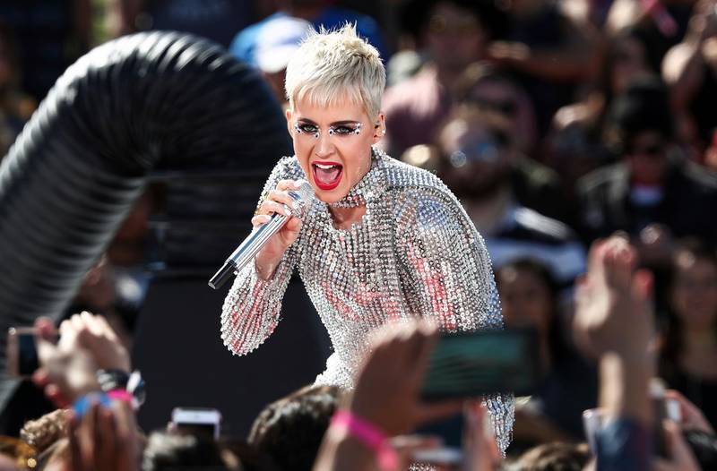 FILE - In this Monday, June 12, 2017, file photo, Katy Perry performs during 'Katy Perry - Witness World Wide' exclusive YouTube Livestream Concert at Ramon C. Cortines School of Visual and Performing Arts in Los Angeles. The pop starâ€™s â€œWitness: The Tourâ€ is pushing back the start of her new tour to Sept. 19 in Montreal. Perry said in a statement Thursday, Aug. 17, that â€œmajor elements of my tour stage design could not be available for me to rehearse on until this week.â€ (Photo by John Salangsang/Invision/AP, File)