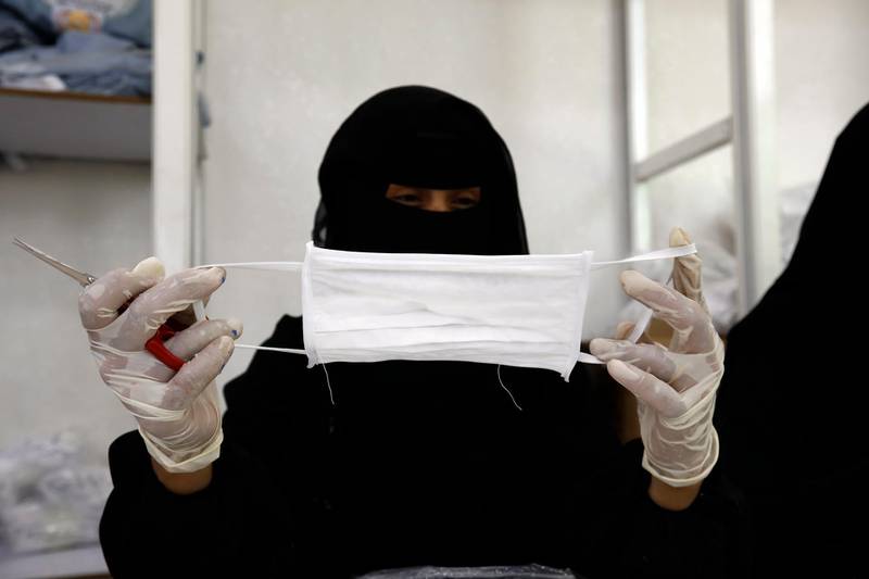More than 160 Yemeni women work in a revitalised textile factory in Sanaa to make nearly 15,000 protective face masks per day amid a severe shortage of surgical masks. EPA