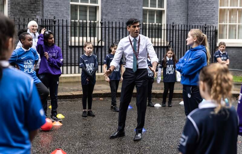Prime Minister Rishi Sunak attends a coaching session for schoolgirls, with past and present England Women's players at Downing Street in London, England. Getty Images