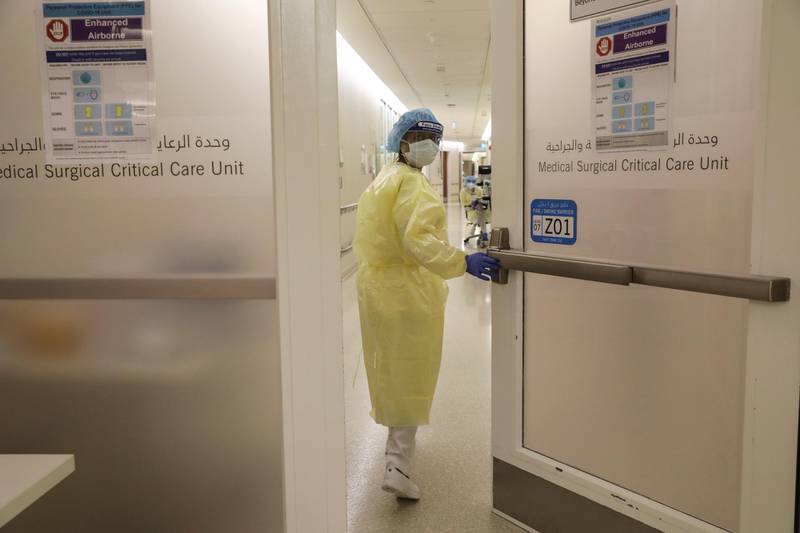 A nurse wearing protective equipment enters the intensive care unit (ICU), amid the coronavirus disease (COVID-19) outbreak, at the Cleveland Clinic hospital in Abu Dhabi, United Arab Emirates, April 20, 2020. REUTERS/Christopher Pike