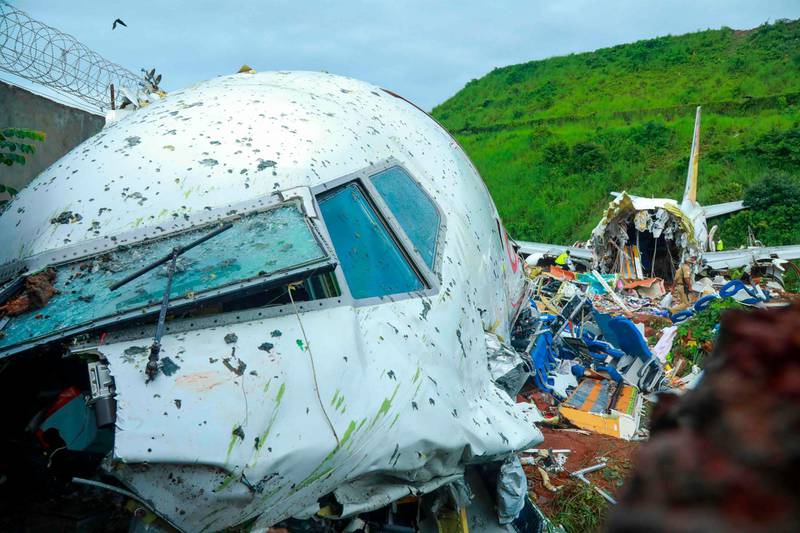 The wreckage of an Air India Express jet at Kozhikode International Airport in Kerala that crash landed on August 7, 2020.  AFP