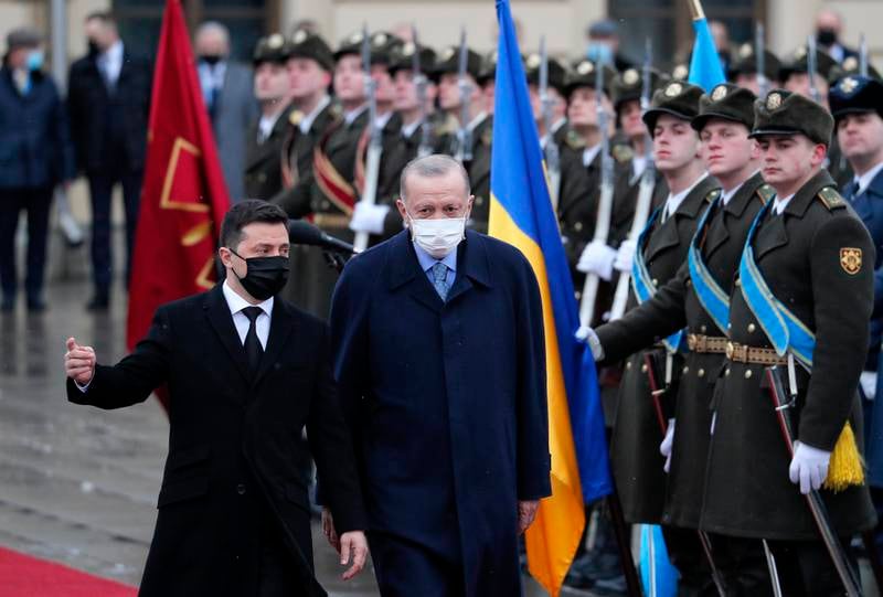 Ukrainian President Volodymyr Zelensky, left, and his Turkish counterpart, Recep Tayyip Erdogan, review the Guard of Honour during their meeting at the Mariinsky Palace in Kiev last week. EPA
