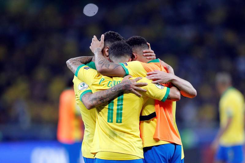 Brazil players celebrate. EPA