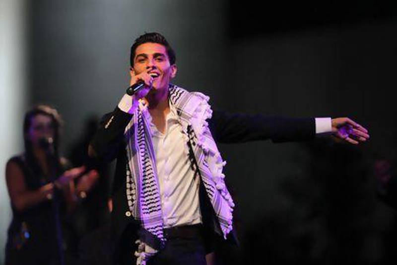 The Palestinian winner of Arab Idol Mohammed Assaf performs in the West Bank city of Ramallah. Abbas Momani / AFP