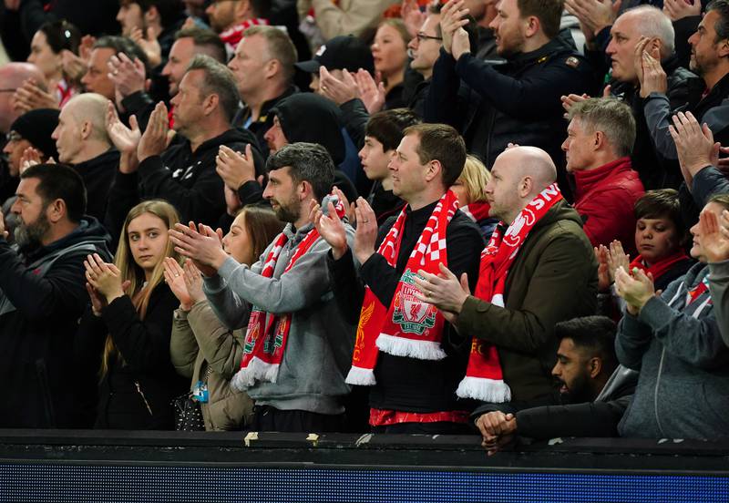 Liverpool fans clap in the 7th minute in a mark of respect to Cristiano Ronaldo following the death of his new-born son. PA