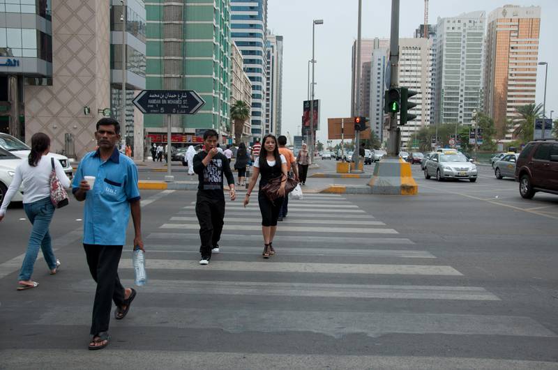 Abu Dhabi\ Hamdan Street. Abu Dhabi is a multicultural city. You can find many people from different nationalities walking around the whole capital. They are employees, students, tourists, locals  and others. 

