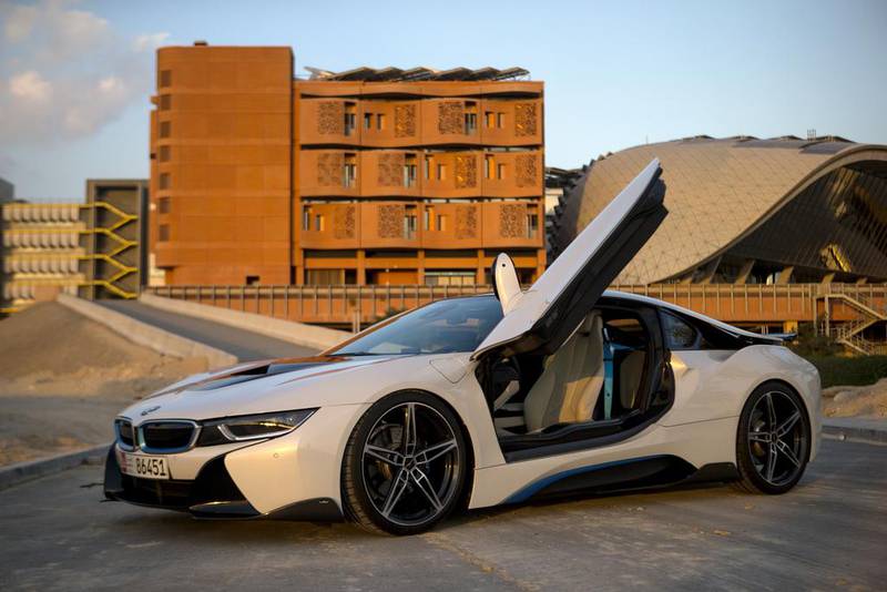 The BMW i8 in Abu Dhabi. The plug-in hybrid combines a 131hp electric motor at the front with a six-speed-automatic, petrol unit at the rear that generates 231hp from a 1.5L engine. Christopher Pike / The National