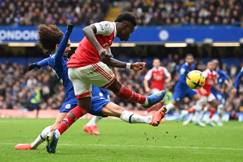 Arsenal attacker Bukayo Saka crosses the ball. AFP