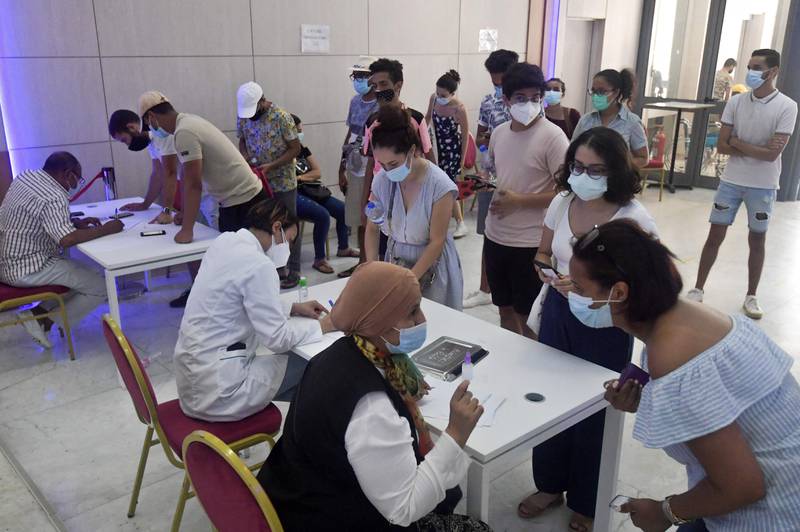 Tunisians register to receive a dose of the Sinopharm vaccine in Tunis. Several countries promised to help Tunisia fight Covid-19 last week when the nation recorded its highest daily death toll since the pandemic began