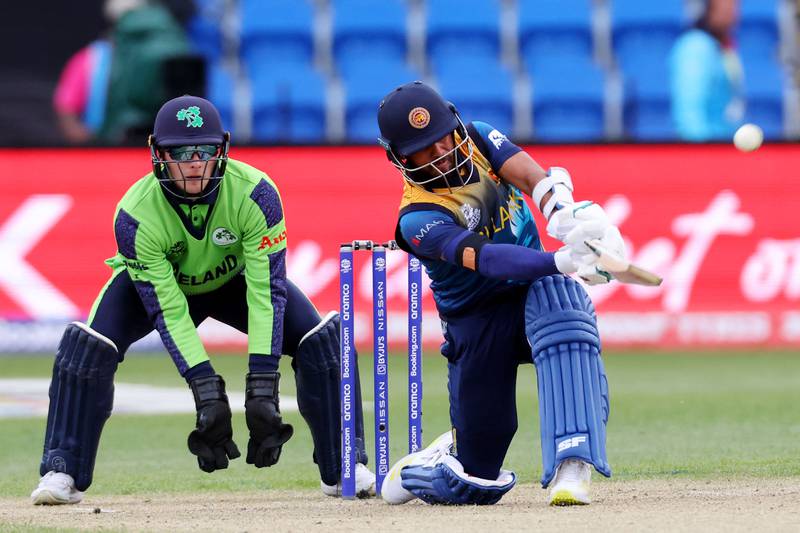 Kusal Mendis plays a shot over the boundary for six as Sri Lanka win the T20 World Cup match against Ireland at Bellerive Oval in Hobart on October 23, 2022. AFP