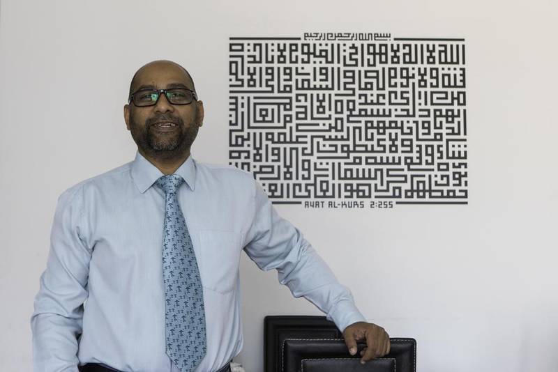 Nooruddin Matheranwala, a banker based in Sharjah, says he is now digging into his savings to keep up with the rising cost of supporting a family. Christopher Pike / The National