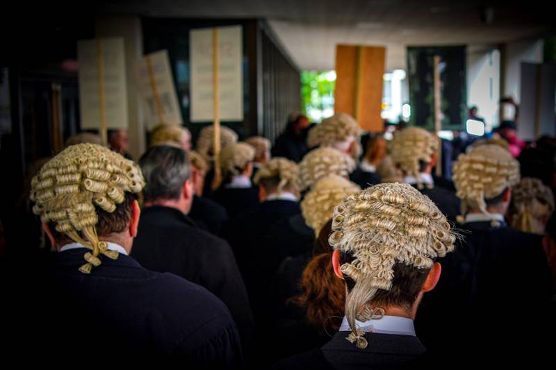 Barristers from the Criminal Bar Association staged a walkout outside Manchester Crown Court on Monday, on the first of several days of action by CBA members in a row over legal aid funding. PA