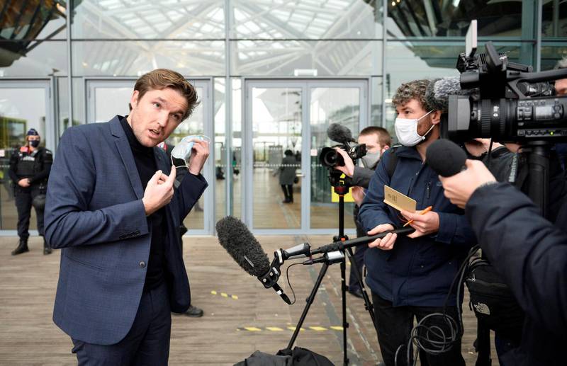 Belgian lawyer Dimitri de Beco, representing Iranian diplomat Assadollah Assadi, charged in Belgium with planning to bomb a meeting of an exiled Iranian opposition group in France, speaks to media as he arrives at the court building in Antwerp, Belgium November 27, 2020.  REUTERS/Johanna Geron