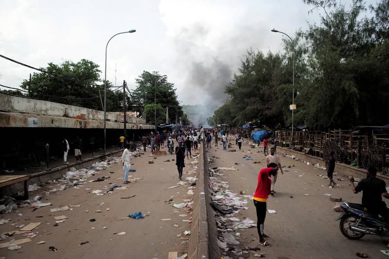 Anti-government protesters burn tires and barricade roads in the capital Bamako, Mali. Reuters