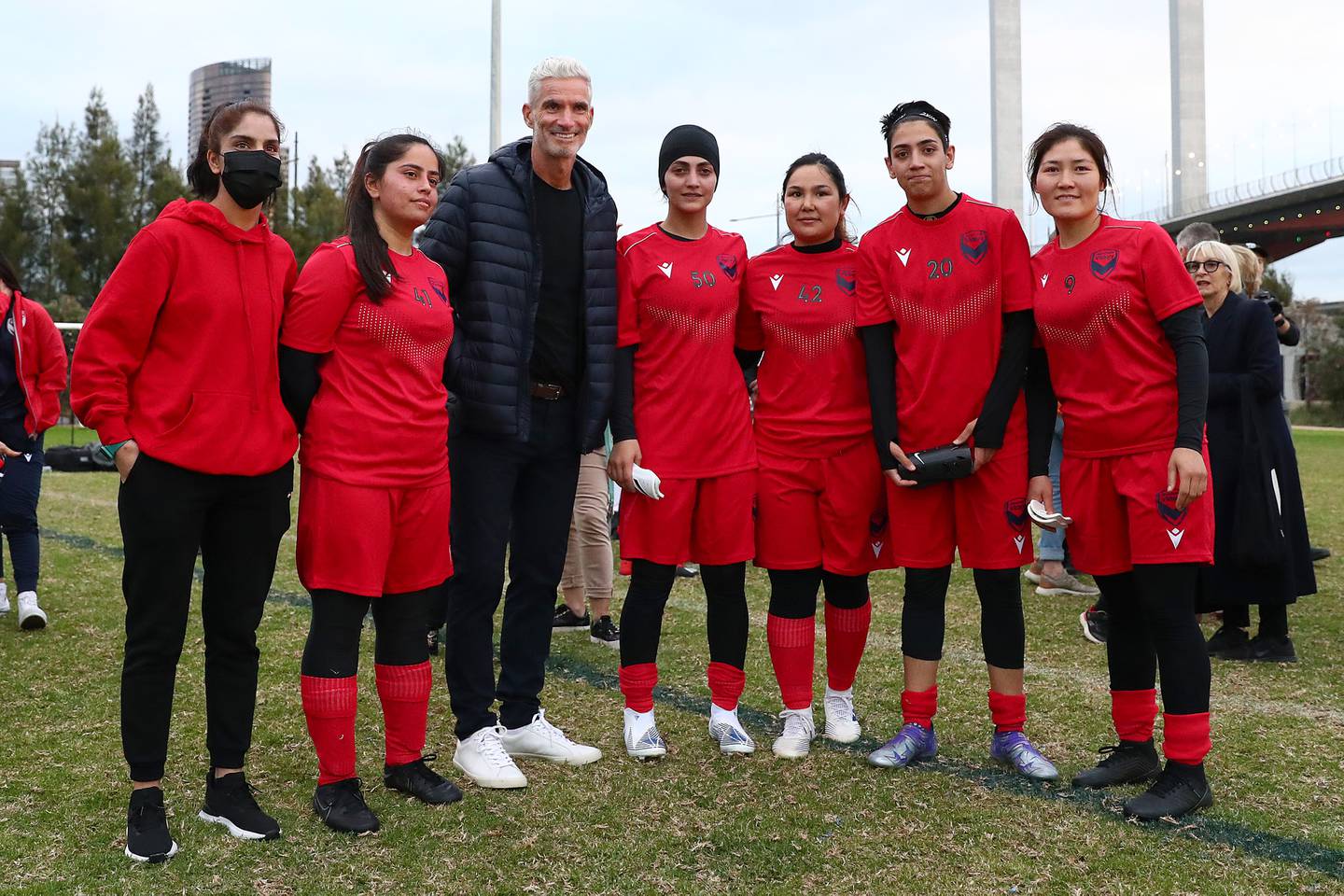 Melbourne Victory Afghan Women's Team with Craig Foster on May 1. Getty