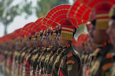 New recruits to the Indian Border Security Force take part in a passing-out parade in Humhama on the outskirts of Srinagar. AFP