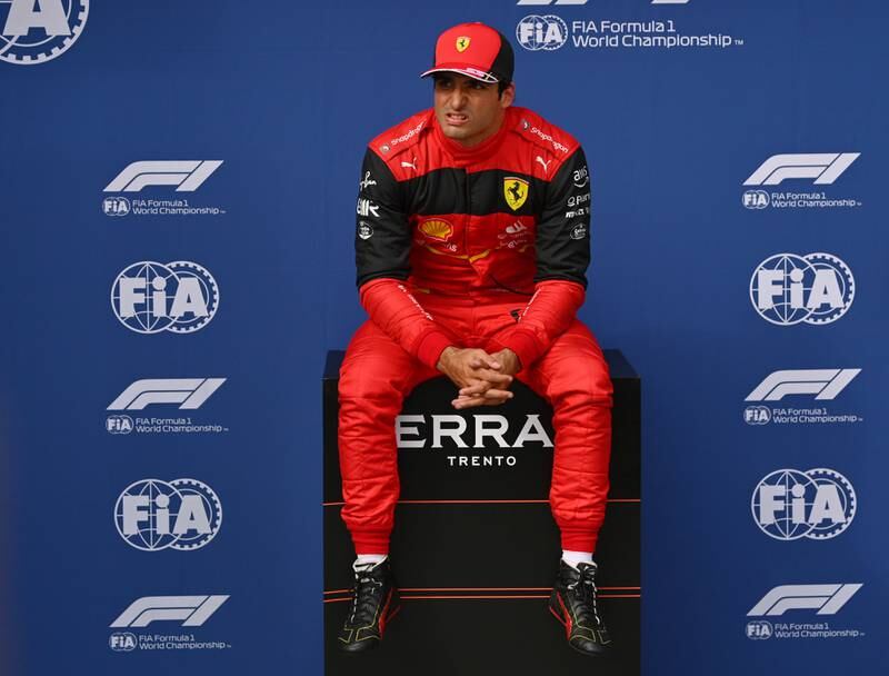Second placed qualifier Carlos Sainz of Spain and Ferrari looks dejected in parc ferme. Getty