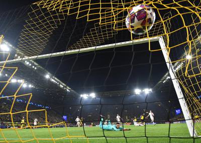 DORTMUND, GERMANY - FEBRUARY 18: Erling Braut Haaland of Dortmund scores his second goal during the UEFA Champions League round of 16 first leg match between Borussia Dortmund and Paris Saint-Germain at Signal Iduna Park on February 18, 2020 in Dortmund, Germany. (Photo by Stuart Franklin/Bongarts/Getty Images)