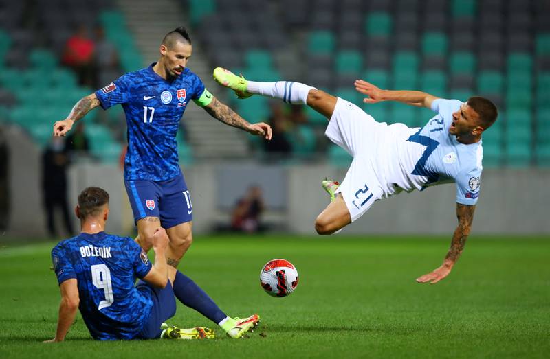 Slovenia's Jan Mlakar goes airborne during the World Cup qualifier against Slovakia at the Stozice Stadium, Ljubljana, on Wednesday, September 1. Reuters