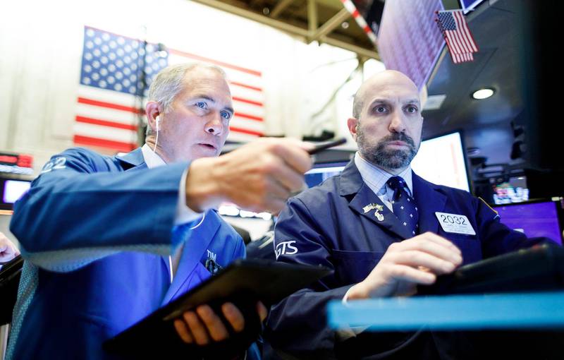 epa08252410 Traders work on the floor of the New York Stock Exchange in New York, New York, USA, on 27 February 2020. Stocks around the world are broadly lower as investors are reportedly reacting to news that the coronavirus is spreading to more countries and the Dow Jones industrial average opened down over 500 points.  EPA/JUSTIN LANE