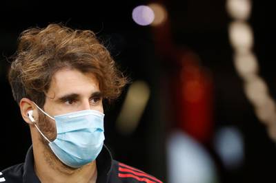 Bayern Munich's Spanish midfielder Javier Martinez wears a face mask as he arrives for the match. AFP