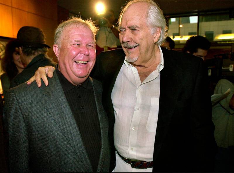 Director-producer Robert Altman, right, laughs with actor Ned Beatty prior to the 25th anniversary screening of 'Nashville,' at the Academy of Motion Picture Arts and Sciences in Beverly Hills, California on June 22, 2000. AP