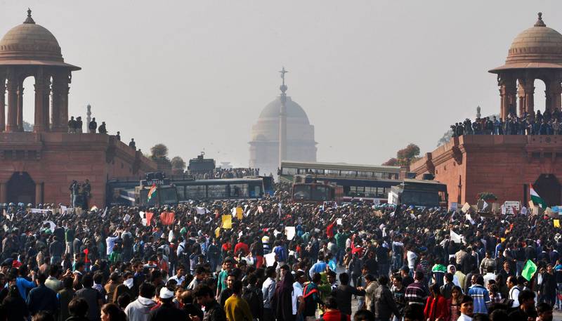 Crowds protest outside the presidential palace in New Delhi on December 22, 2012 as a wave of anger over the gang rape swept across India. AP Photo