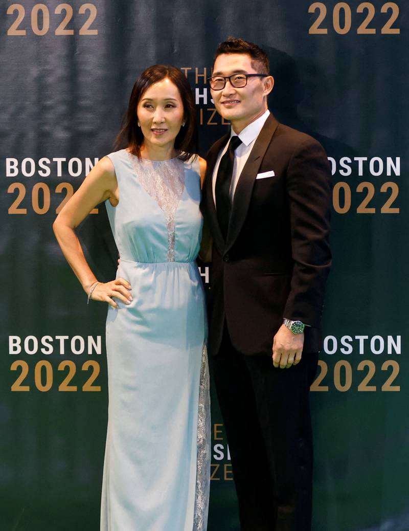 Actor Daniel Dae Kim and wife Mia pose for photos. Reuters