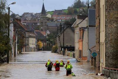 French firefighters in a flooded street in Saint-Etienne-au-Mont in northern France after heavy rain caused the La Liane river to burst its banks. Reuters