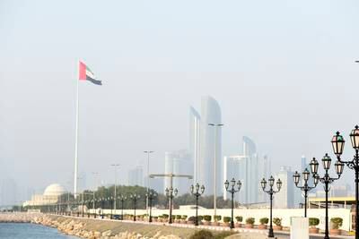 The Abu Dhabi skyline. The UAE’s non-oil foreign trade hit a record $607.1 billion last year. Khushnum Bhandari / The National
